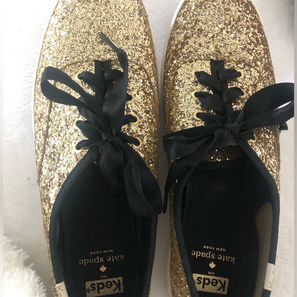 kate spade gold glitter sneaker with black laces